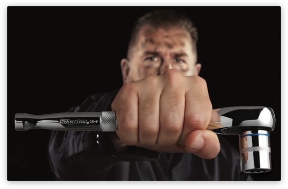 Quality You’ve Come to Expect Guy holding tool